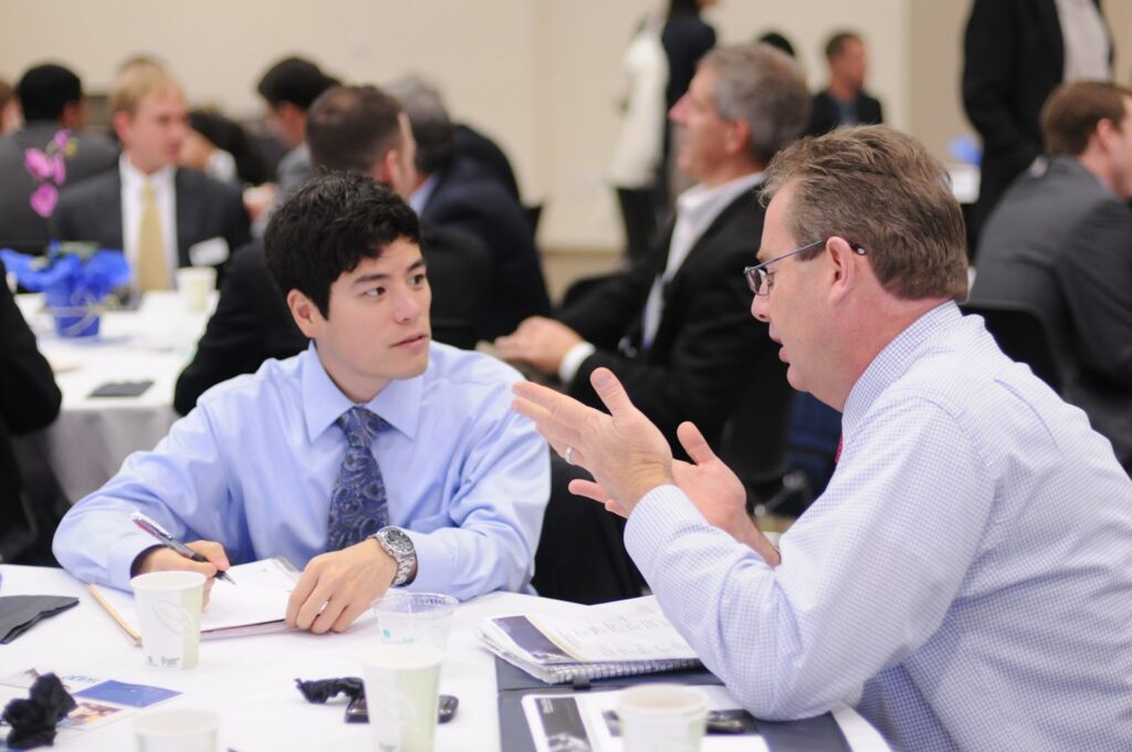 A high school student gets advice from his business mentor